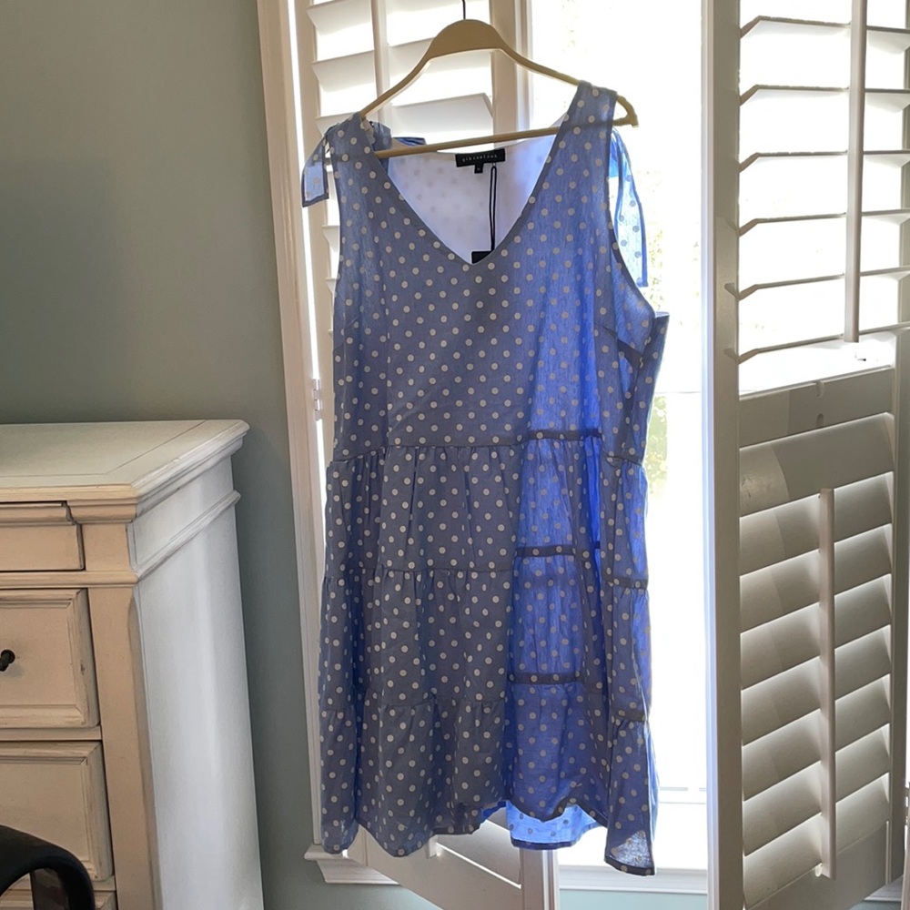 Blue and white polka dot sleeveless dress